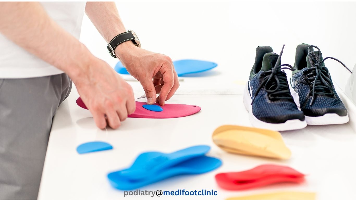 Podiatrist assessing foot mechanics