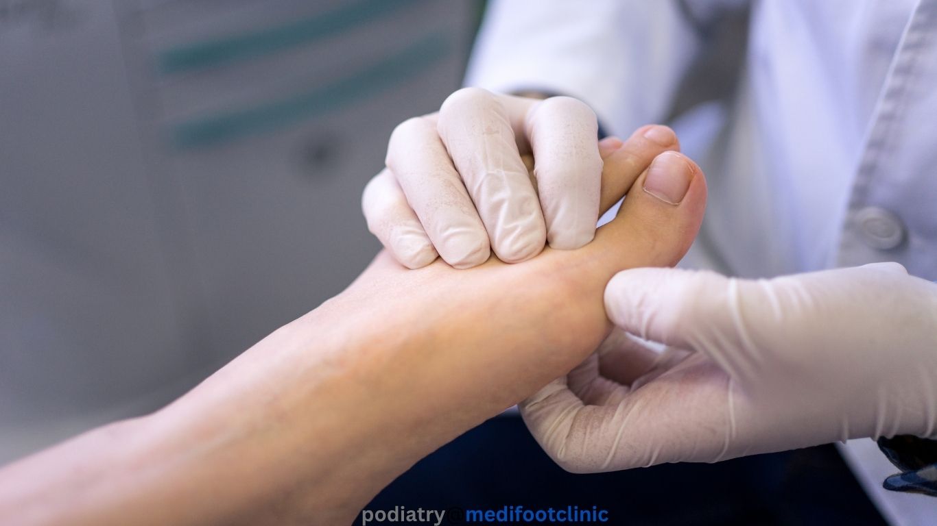 Podiatrist examining foot xray